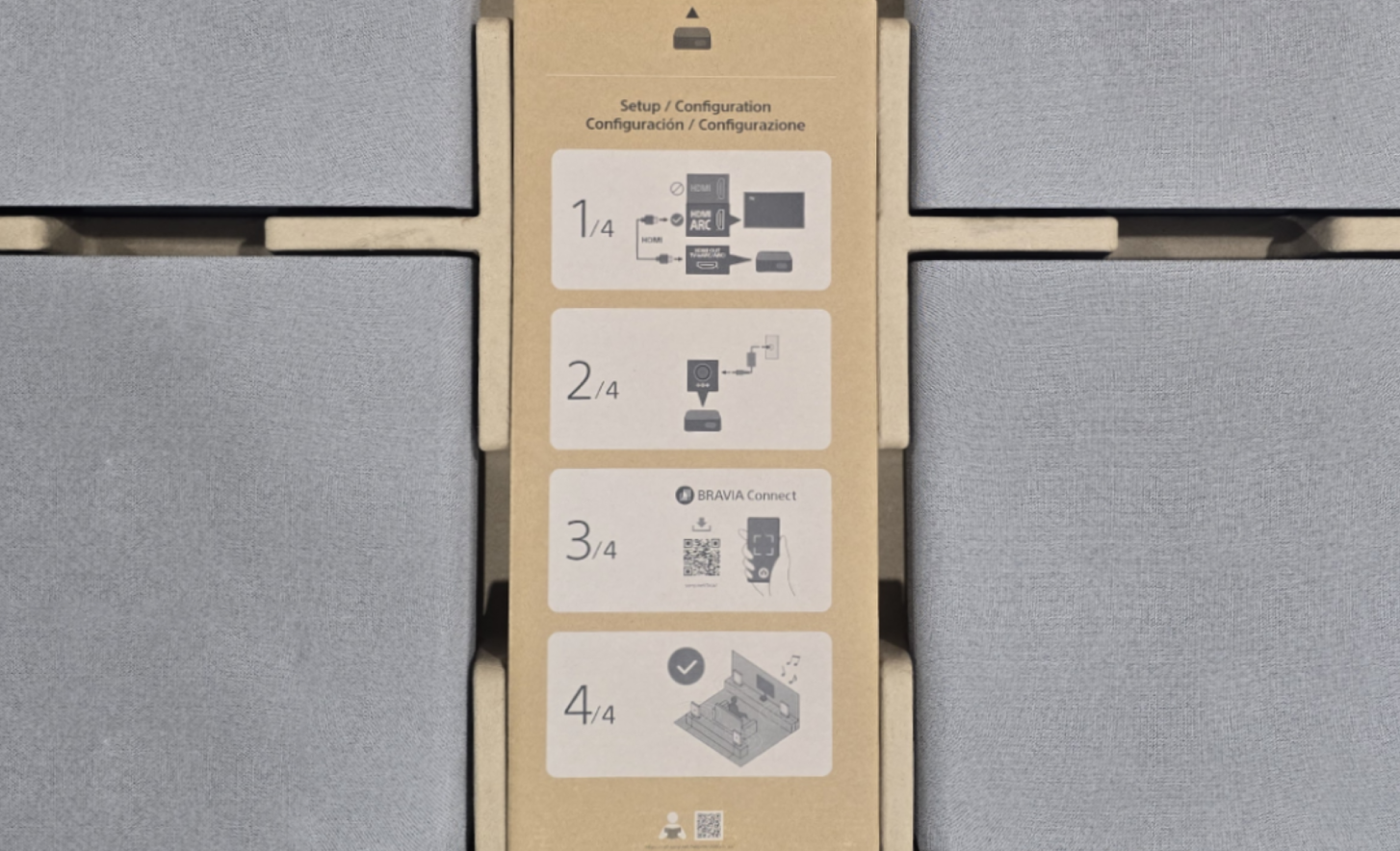 Packaging of the BRAVIA Theatre Quad with a setup guide shown in the box.