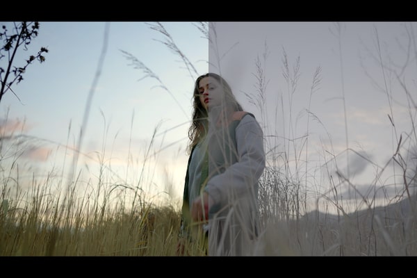 Image of a woman walking across a field