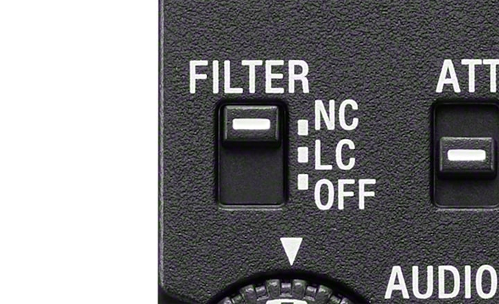 Close-up view of the filter switch on the rear panel. The switch is set to the noise cut filter.